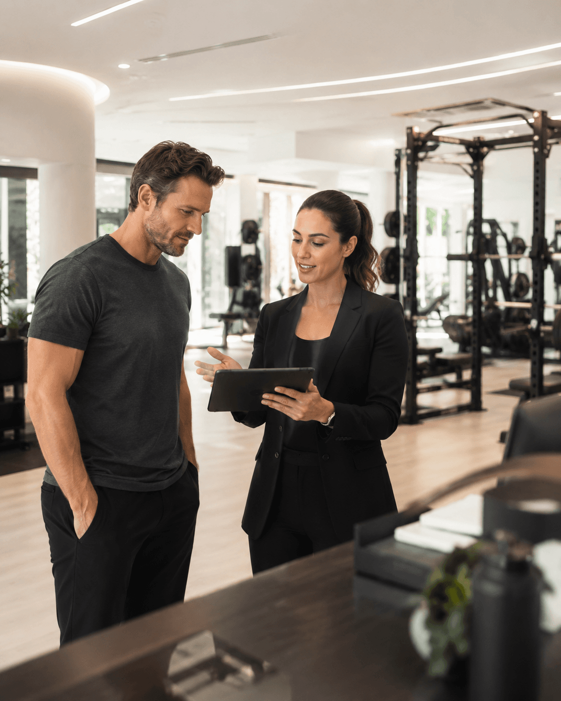 Premium gym owner reviewing a private GymnexAI demo